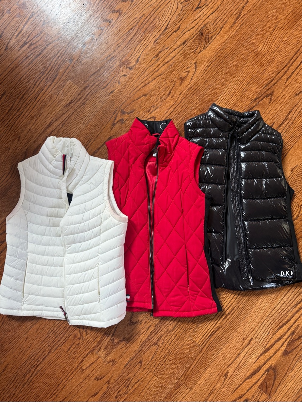 Calvin Klein Quilted & Puffer Vest Trio in White, Red, and Black .